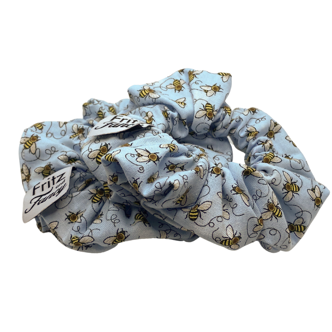 Honey Bees on Pale Blue